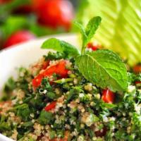 Tabbouleh Salad · Parsley, quinoa, tomato, green onion, fresh mint, and lemon olive oil dressing on the side.