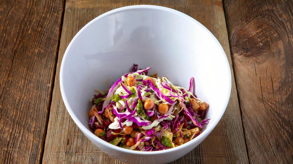 Beets & Cabbage Salad · Beets, garbanzo beans, cabbage, cilantro mint chutney and lemon olive oil dressing on the side.
