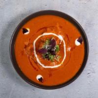Saffron's Famous Butter Chicken · Saffron’s roasted chicken simmered in makhani (spiced tomato) sauce, fenugreek, and ginger. ...