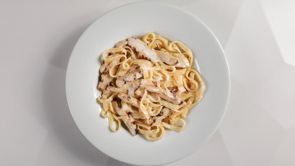 Pasta Milano · Roasted chicken, sun - dried tomatoes, mushrooms, pasta, roasted - garlic cream sauce (600 cal.).