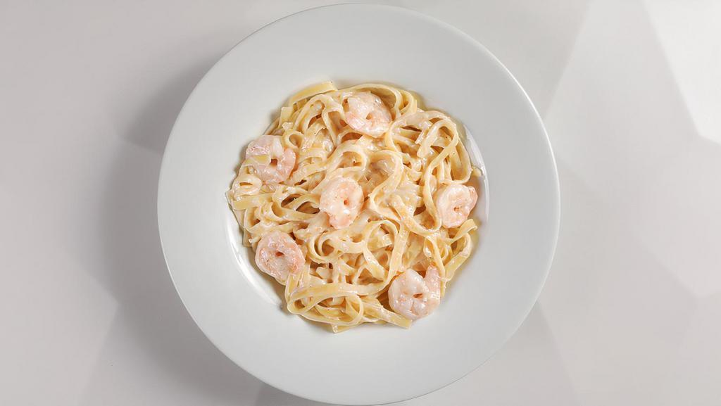Fettuccine Alfredo With Shrimp · Parmesan, butter, cream (604 cal.).