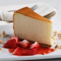 New York Style Cheesecake · Shortbread crust, decadent cheesecake, fresh strawberries (1018 cal.).
