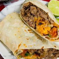 Burrito · Filled with savory filling: vegetables(tomatoes, cheese, avocado), choice of meat (asada, ca...