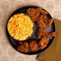 Fried Chicken Wing Dinner · Six crispy chicken wings with your choice of dipping sauce and a side.