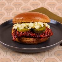 Nashville Hot Fried Chicken Sandwich · Nashville-style hot fried chicken breast with coleslaw, spicy mayo, and pickles on a buttery...