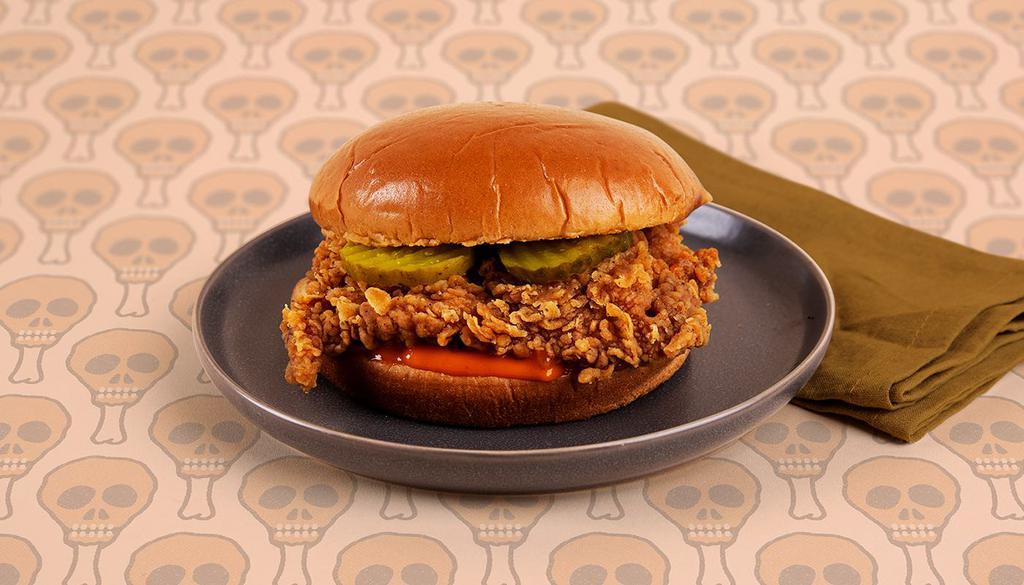 Fried Chicken Sandwich · Crispy fried thigh breast with pickles and mayo on a buttery brioche bun.