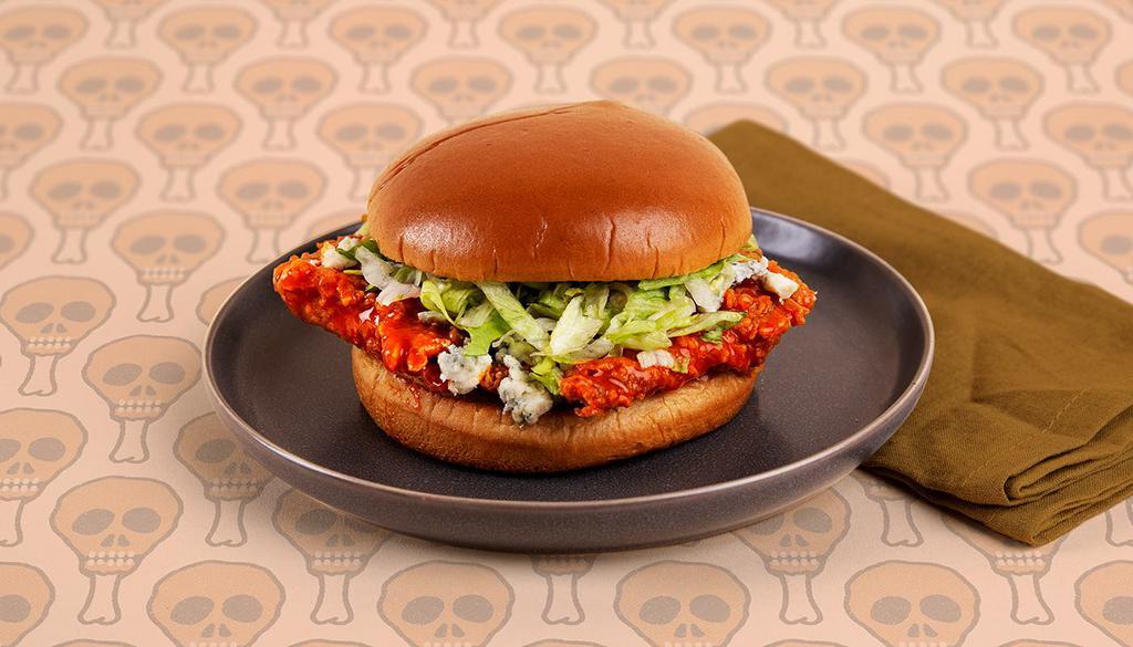Buffalo Fried Chicken Sandwich · Spicy buffalo fried chicken breast with blue cheese and lettuce on a buttery brioche bun.