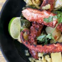 Pulpo Al Pastor · Octopus, potatoes, brussels sprouts, caramelized pineapple, cilantro.