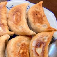 Pot Stickers (6) · Served with pork and Vegetable