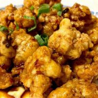 Mandarin  Chicken · Spicy. Diced Chicken Deep-Fried and Tossed with a Spicy Garlic Sauce.