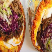 3. Bobcha Burrito · Potato tots, lettuce, sour cream, cheese, pico de gallo, kimchi, a choice of protein with sm...