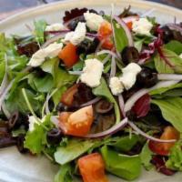 House Salad · Mixed organic greens, tomatoes, olives, goat cheese, and sliced onions with a lemon olive oi...