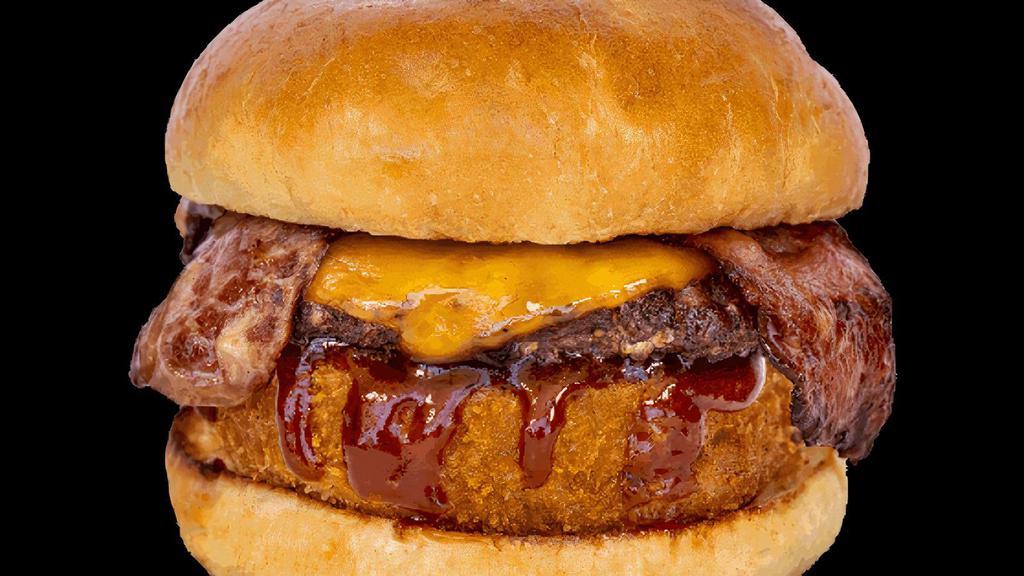 B'igi WESTERN · 1/4 lb Angus beef, BBQ sauce, cheddar cheese, turkey bacon, onion ring.