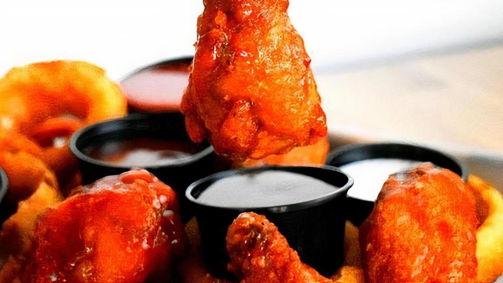 6 Wings · Chicken wings, hormone free, antibiotic free and 100% halal with your choice of sauce