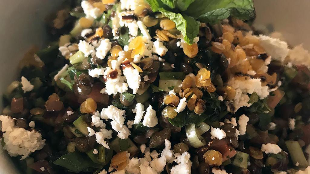 Lentil · Mix of green and red lentils tossed with olive oil, balsamic glaze, chopped cucumbers, tomatoes, garlic, parsley and feta cheese.