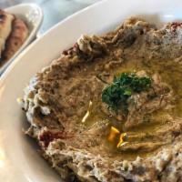 Baba Ganoush · Smoked eggplant dip with tahini and olive oil.