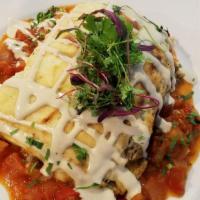 Moussaka · Layers of lamb cooked in a tomato based sauce, layered with sweet eggplants and creamy bécha...