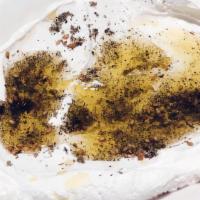 Labne · A reduction of organic yogurt topped with za’atar and extra virgin olive oil.
