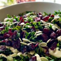 Crispy Kale Salad · Gluten free. served warm with quick-roasted kale, cranberries, pumpkin seeds, and a creamy d...