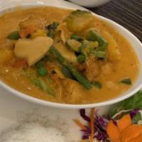 Pumpkin Curry · Thai-style homemade curry with pumpkin, coconut milk, peas, bell pepper and basil.