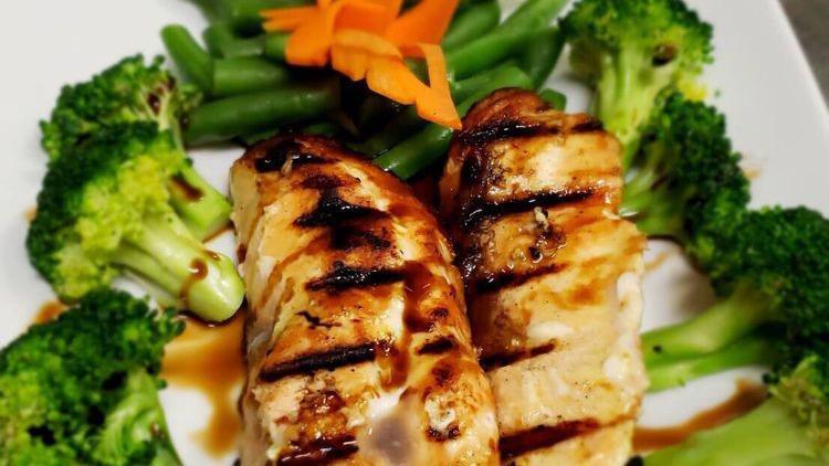 Salmon Satay · Grilled salmon with teriyaki sauce served w/ peanut sauce and steamed vegetables.