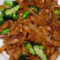Pad See-Ewe · Sautéed rice noodles with egg, carrot, broccoli, and mushrooms.