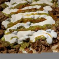 Durango Nachos · French fries, any meat, beans, melted jack cheese, sour cream, guacamole, salsa.