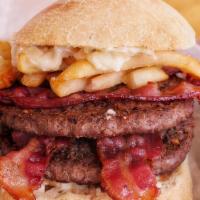 MUFASA · Two 4 oz Angus Beef Patties/Four Bacon/French Fries inside/Extra Garlic Cheese Spread/Brioch...
