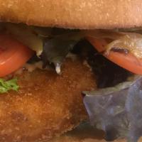 CRABBY PATTY · Two Breaded Crabcakes / Leafy Greens / Grilled Onions / Tomatoes / Sriracha Mayo Sauce / Bri...