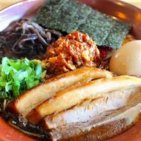 Niku Spicy Ramen · Our new spicy ramen. Niku version topped with 2x chashu and ajitama.. Also topped with  gree...