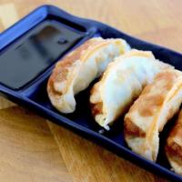 Deep Fried Gyoza · 4 pieces of deep fried gyoza with special soy sauce.