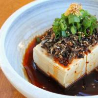 Hiyayakko · Cold tofu with green onion, deep-fried niboshi with lard, chili oil, ponzu sauce, sesame, an...