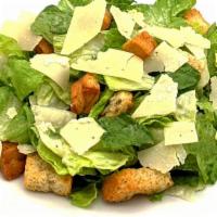 Caesar Salad · Crisp romaine lettuce, parmesan and croutons served with creamy Caesar dressing.