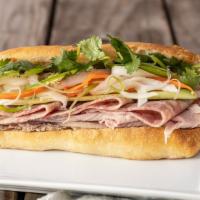 Z7T. Classic Bánh Mì · Country ham, pate, demi baguette, pickled carrots & daikon, cilantro, scallions, cucumbers, ...