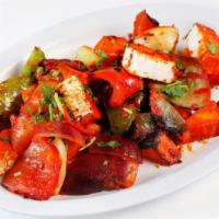 Paneer Tikka Kebab · Paneer, bell pepper, onion marinated in fenugreek, spices and yogurt sauce.