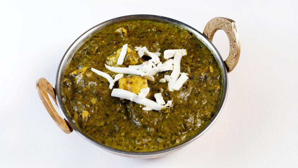 Saag Chicken · Healthy preparation consisting of boneless chicken prepared with Indian spices and spinach.