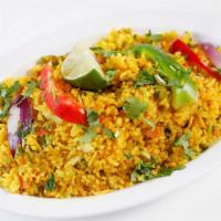 Veggie Biryani · Saffron flavored basmati rice with assorted veggies.