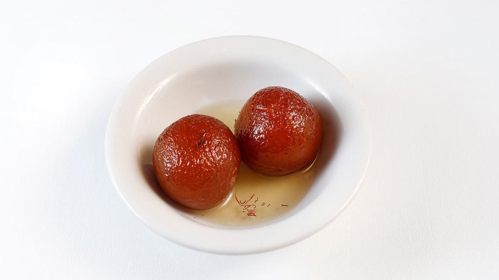 Gulab Jamun (2 pcs) · Fried dumplings traditionally made of thickened or reduced milk, soaked in rose flavored sugar syrup.