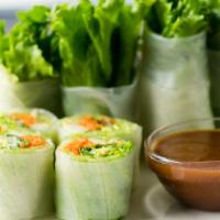 Summer Rolls · Red leaf lettuce, avocado, mint, cilantro, cucumber, carrots, and garlic noodle rolled in fr...