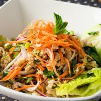 Larb · Minced chicken tossed with mint, lemongrass, red onions, cilantro, scallions, chilli flakes,...
