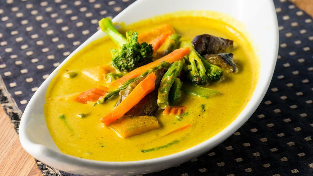 Pumpkin Veggie Curry · Pumpkin, eggplant, broccoli, string beans, and carrots stir-fried in yellow curry garlic sauce. Add tofu for an additional charge.