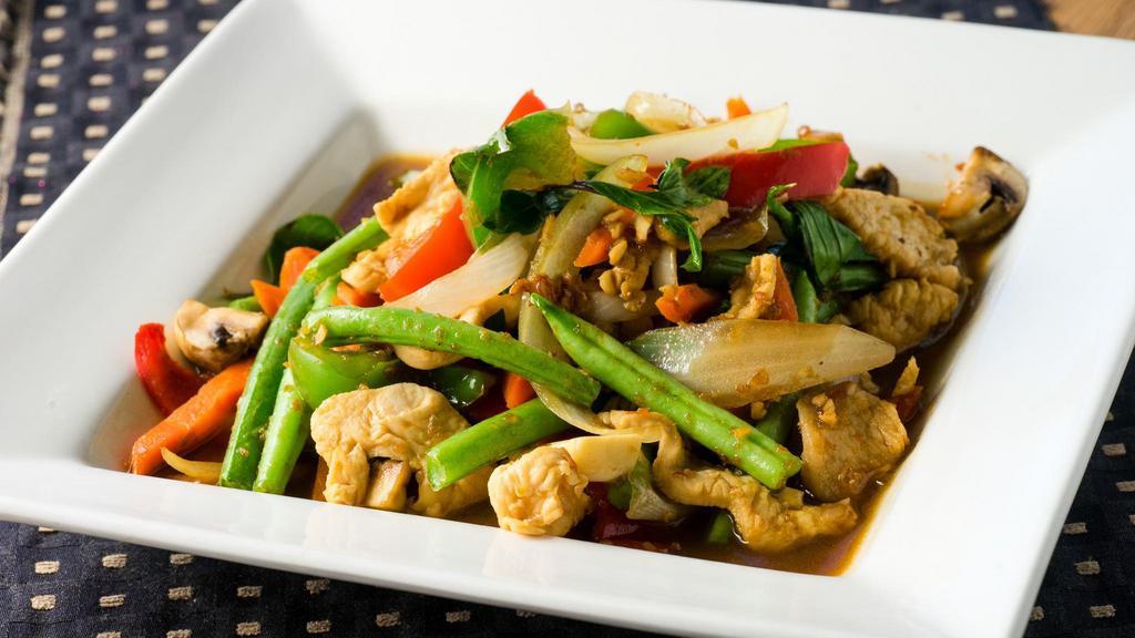 Pad Ginger · Sautéed young ginger, baby corn, mushrooms, bell peppers, carrots, onions, and scallions in brown bean sauce. Choice of chicken, beef, pork, tofu, shrimp or mixed vegetables.