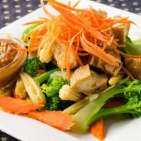 Pak Raug · Fresh seasonal mixed steamed veggies topped with peanut curry sauce and your choice of chick...