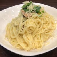 Fettuccine Alfredo · Homemade Alfredo Sauce tossed with fettuccine noodles, topped with parmesan cheese