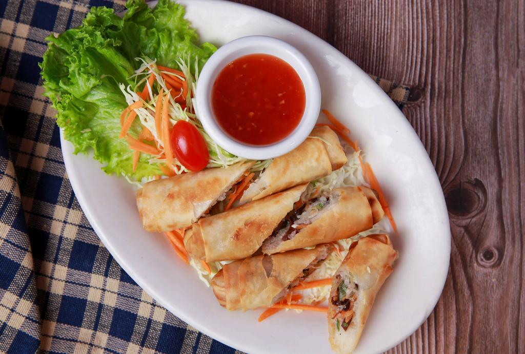 Egg Rolls · 3 rolls of deep fried vegetarian egg rolls stuffed with silver noodle, black mushroom, carrot, and cabbage served with sweet plum sauce.