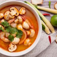 Tom Yum Soup · Thai style hot and sour soup with mushroom, tomato, galanga, lemongrass, and your choice of ...
