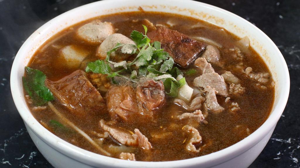 Beef Noodle Soup · Sliced beef, beef balls, stewed beef, or combination with spinach or morning glory and bean sprout in spicy beef broth.