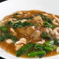 Rad Nar · Thai style gravy sauce with Chinese broccoli and your choice of meat served over stir fried ...