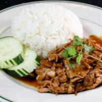 Kao Gra Tiam · Sauteed your choice of meat or vegetables in garlic sauce served over steamed rice topped wi...