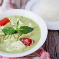 Green Curry · Thai green curry with bell pepper, bamboo shoot, green bean, and basil served with steamed r...
